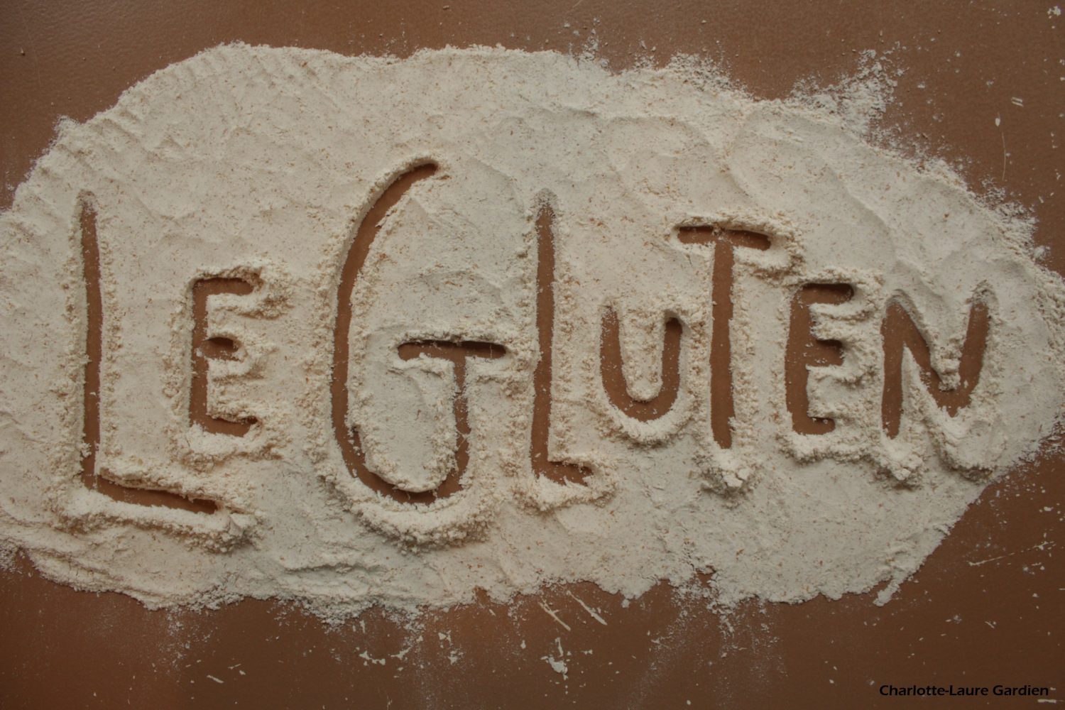 Qu
